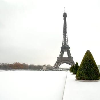 eiffel tower with snow