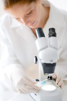 Microscope laboratory - woman medical research
