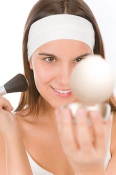 Make-up skin care - woman apply powder