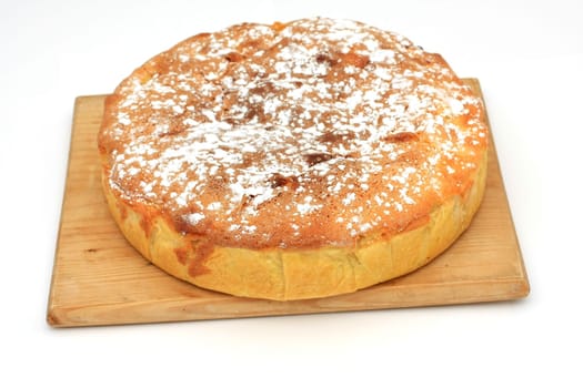 Pie on a traditional wooden plate