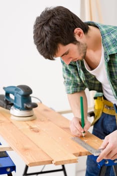 Home improvement - handyman prepare wooden floor