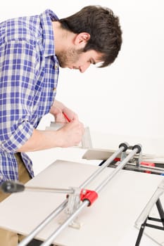 Home improvement - handyman cut tile