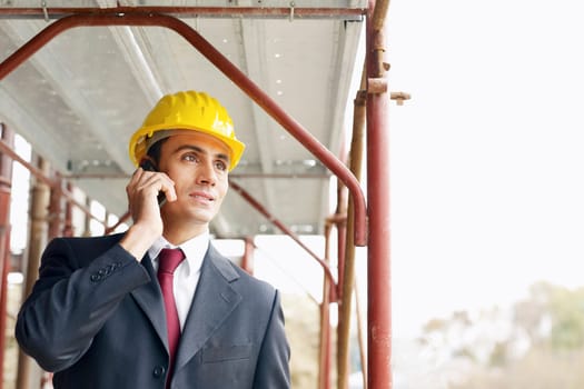 architect with building plans