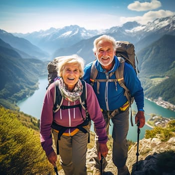 Happy retired couple traveling in the mountains in autumn. High quality photo