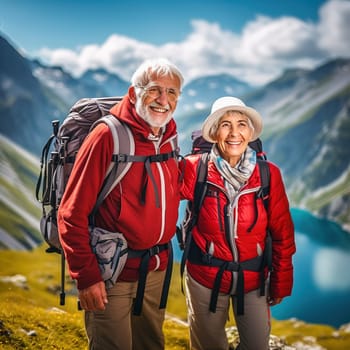 Happy retired couple traveling in the mountains in autumn. High quality photo