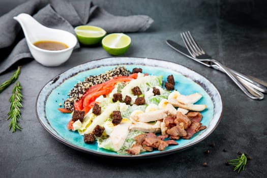 appetizer of meat, quail eggs, bell pepper, croutons, lettuce and sauce