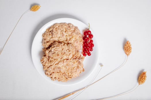 whole grain cookies with a sprig of red currants