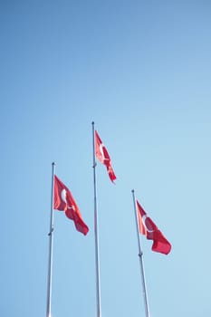 Low Angle View Of Turkish Flag Against Sky