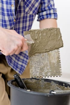 Home improvement - handyman laying tile
