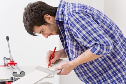 Home improvement - handyman cut tile
