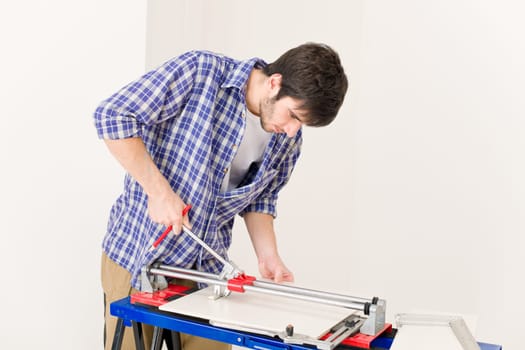 Home improvement - handyman cut tile