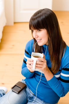 Teenager girl relax home - listen to music