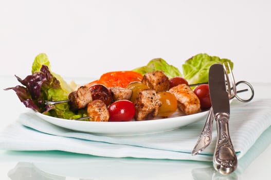 Shashlik skewers with onions and tomatoes