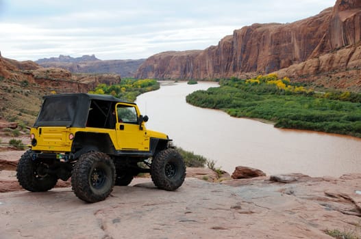 Jeep Travels Down Rugged Moab Rim Trail