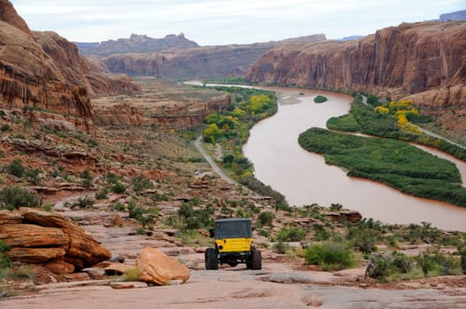 Jeep Travels Down Rugged Moab Rim Trail