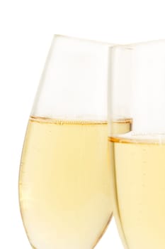 Slanted champagne glass behind others