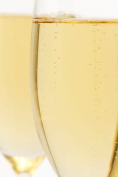 champagne glass in front of others