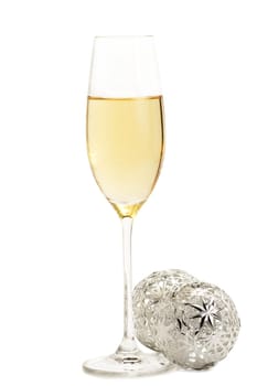 Sparkling wine with two metal baubles