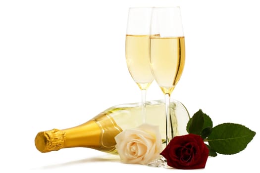 Sparkling wine with roses and champagne bottle