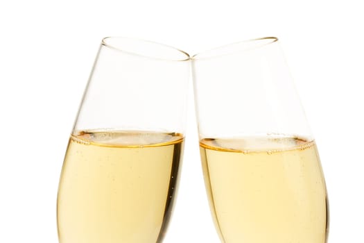 Two slanted champagne glasses