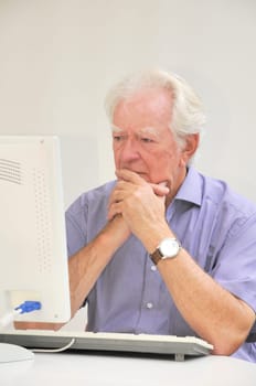 Senior with computer