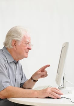 Senior with computer
