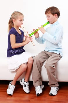 Kids playing flute