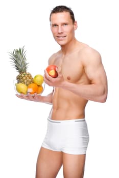Young man with a fruit bowl