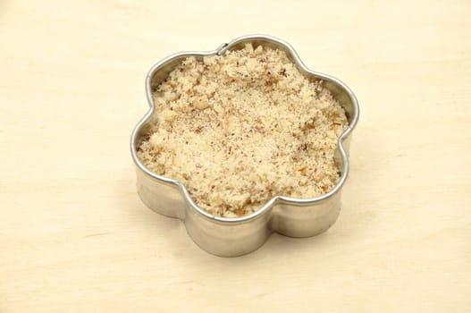 Cookie cutter with hazelnuts