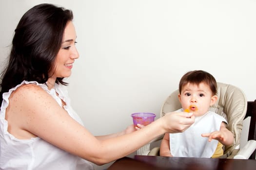 Baby first solid food eating puree