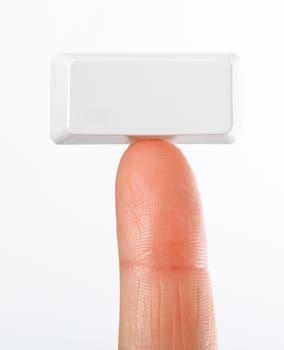 Blank rectangular button on fingertip