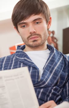 man with newspaper
