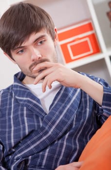sad man in bathrobe