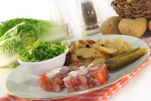 Fried potatoes with aspic