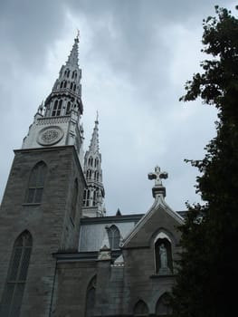 Grey basilica in Ottawa by stormy weather