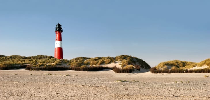 Panorama with lighthouse,beach and dunes