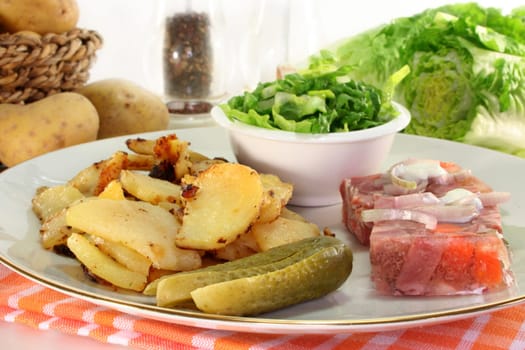 Fried potatoes with aspic