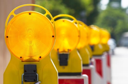 Construction site lamps in series
