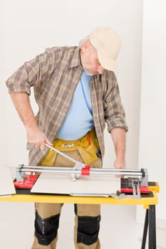 Home improvement - handyman cut tile