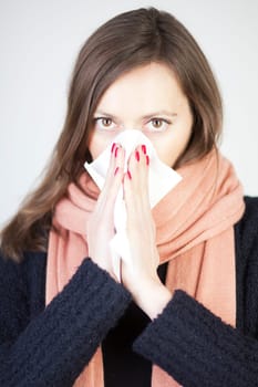 Woman sneezing