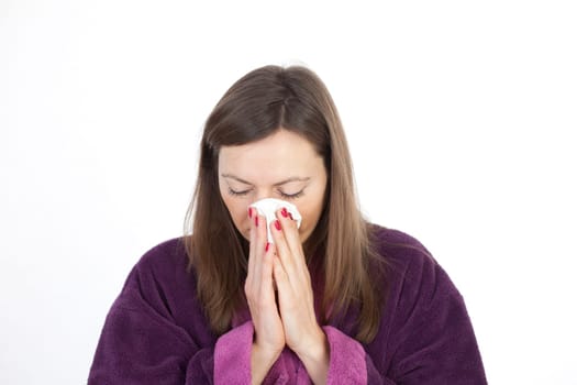 Woman sneezing