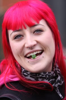 young woman nibbling sweets
