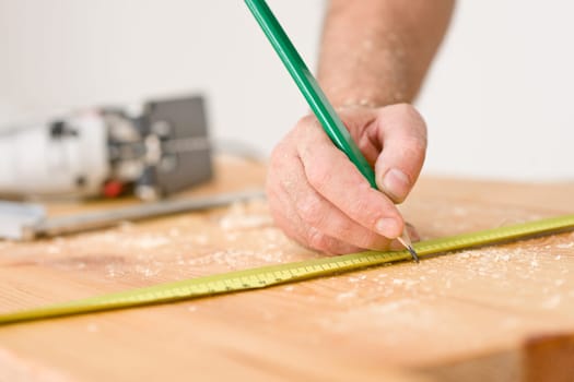 Home improvement - close-up of measuring wood