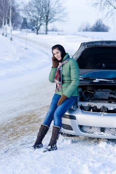 Winter car breakdown - woman call for help