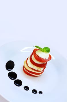 caprese - italian fresh appetizer (tomato, mozzarella, basil)