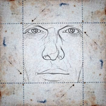 face on stained paper