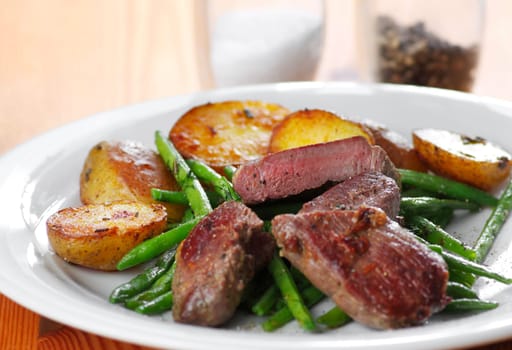 Lamb steak with beans