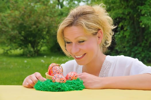 Young woman and easter eggs