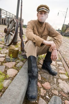 Retro style picture with resting soldier