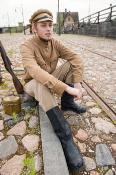 Retro style picture with resting soldier